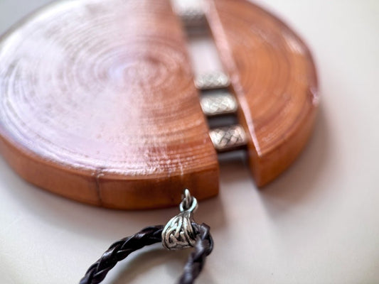 Unique wooden pendant with silver inlays, made from carefully polished beech - Ornamentico shop