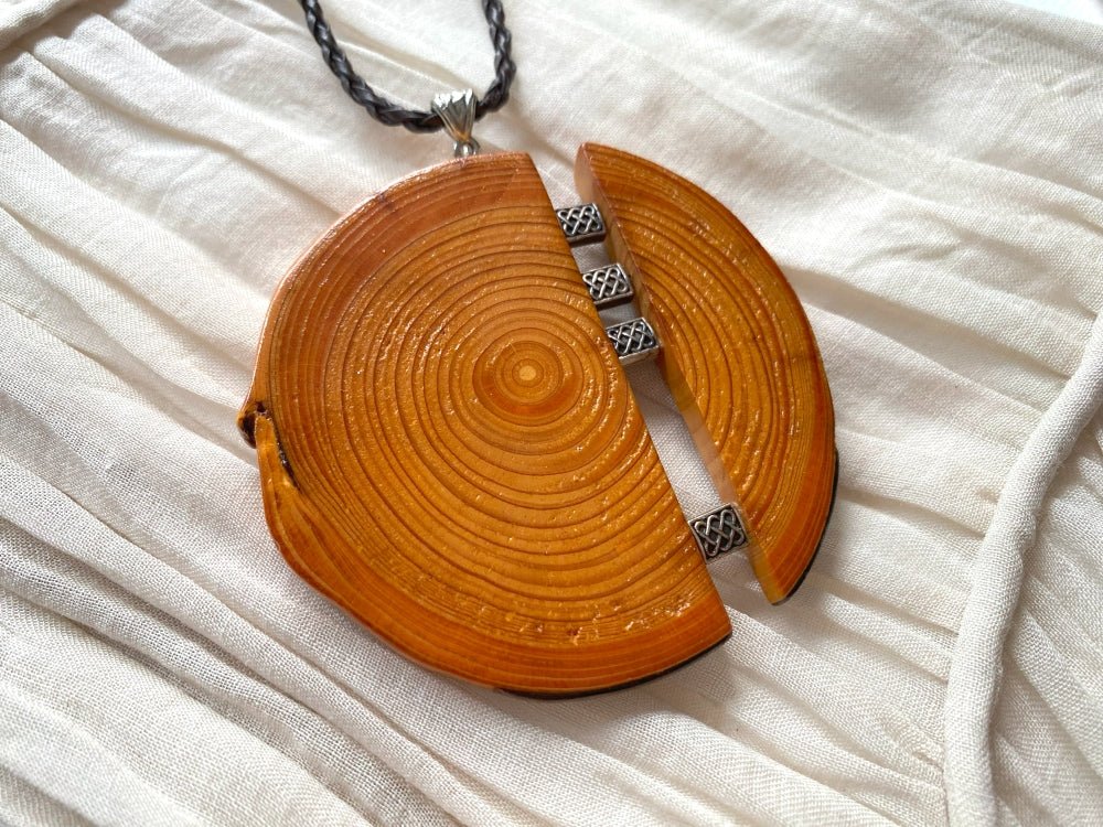 Unique wooden pendant with silver inlays, made from carefully polished beech - Ornamentico shop
