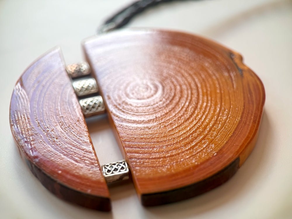 Unique wooden pendant with silver inlays, made from carefully polished beech - Ornamentico shop