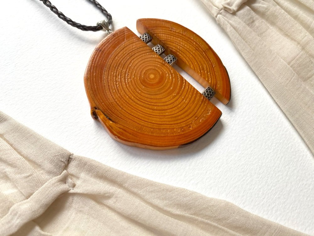Unique wooden pendant with silver inlays, made from carefully polished beech - Ornamentico shop