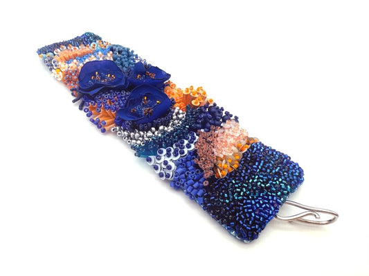 Exclusive statement volume-beaded bracelet in deep blue, orange and matte silver hues crafted from beads, sequins, textile and natural stones - Ornamentico shop