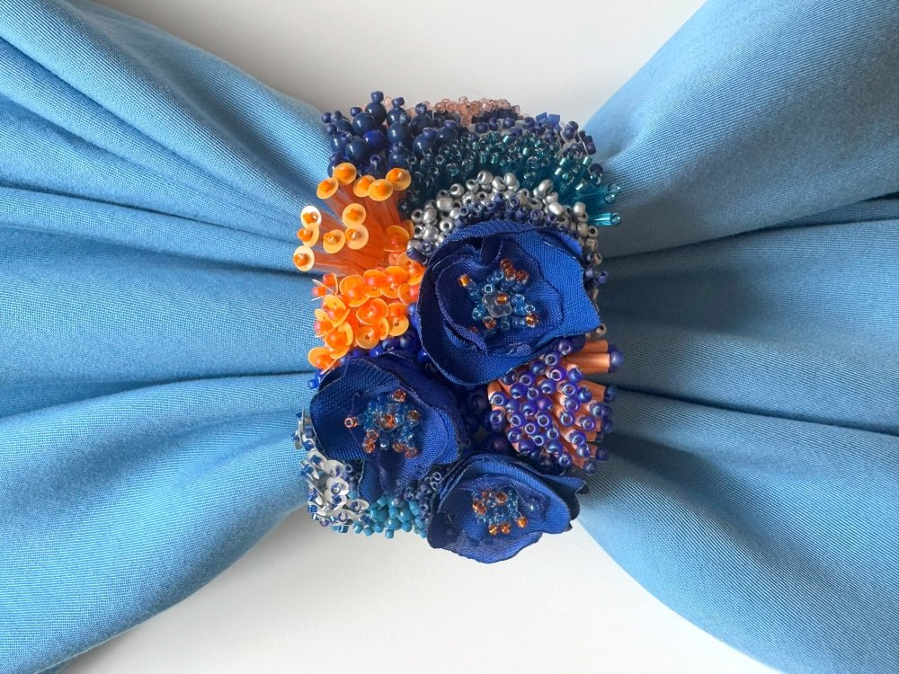 Exclusive statement volume-beaded bracelet in deep blue, orange and matte silver hues crafted from beads, sequins, textile and natural stones - Ornamentico shop