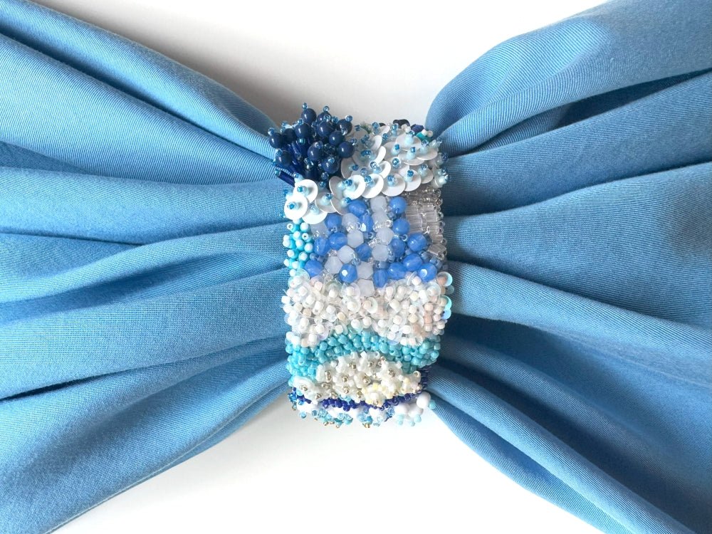 Exclusive handmade bracelet crafted from beads, sequins and rhinestones in a variety of blue and white hues using volume-beading technique - Ornamentico shop