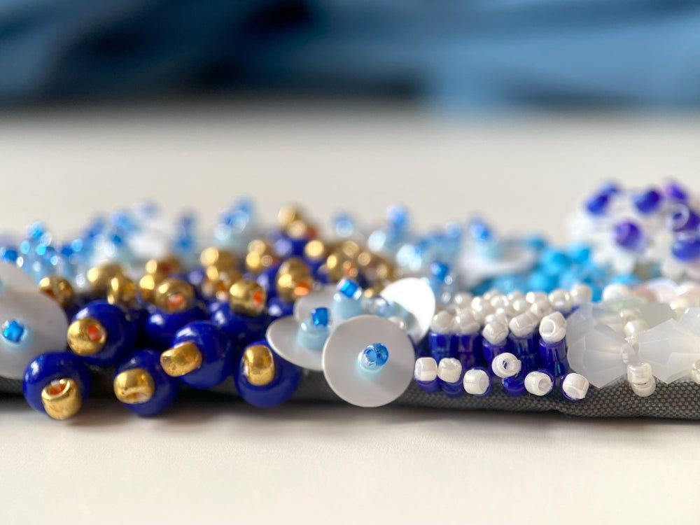Exclusive handmade bracelet crafted from beads, sequins and rhinestones in a variety of blue and white hues using volume-beading technique - Ornamentico shop