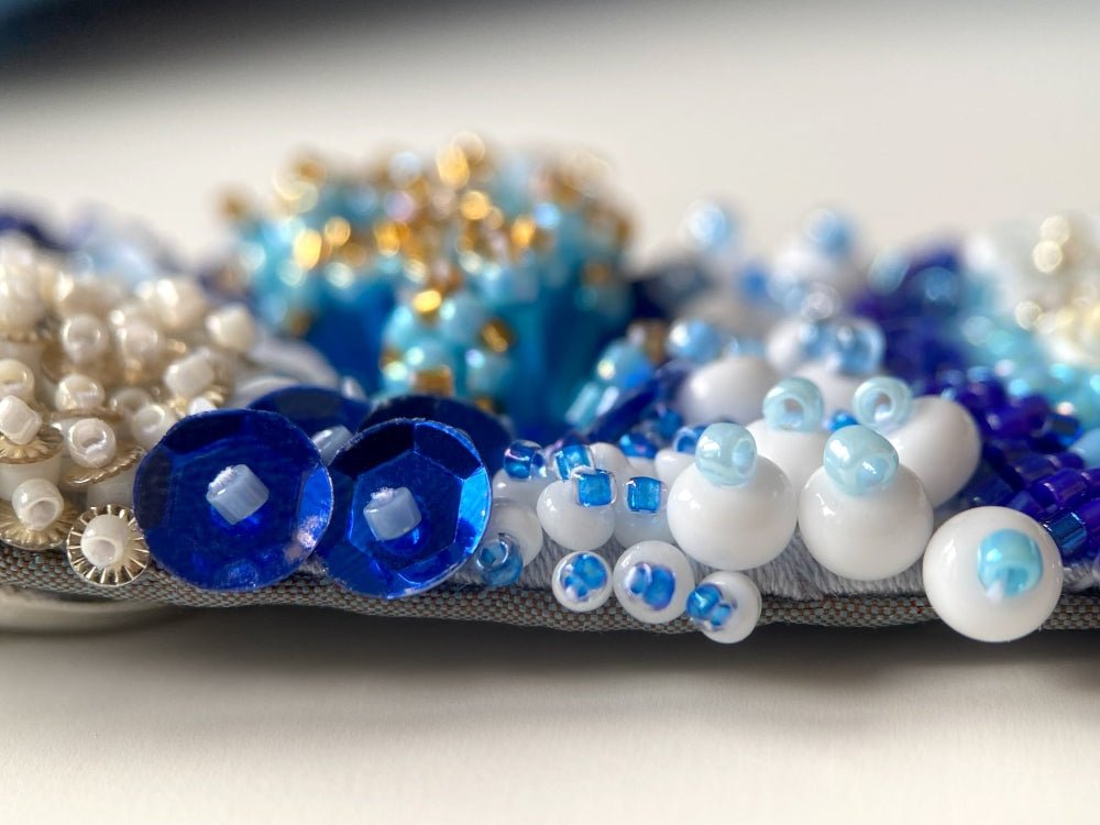 Exclusive handmade bracelet crafted from beads, sequins and rhinestones in a variety of blue and white hues using volume-beading technique - Ornamentico shop