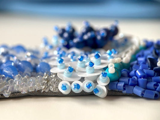 Exclusive handmade bracelet crafted from beads, sequins and rhinestones in a variety of blue and white hues using volume-beading technique - Ornamentico shop