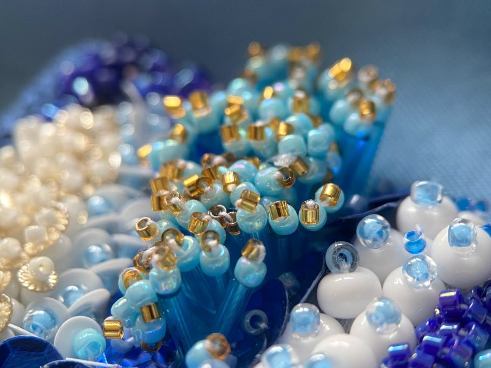 Exclusive handmade bracelet crafted from beads, sequins and rhinestones in a variety of blue and white hues using volume-beading technique - Ornamentico shop