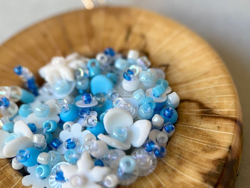 Exclusive wooden pendant with volume-beaded inlay crafted in floral motif using light blue and white hues - Ornamentico shop