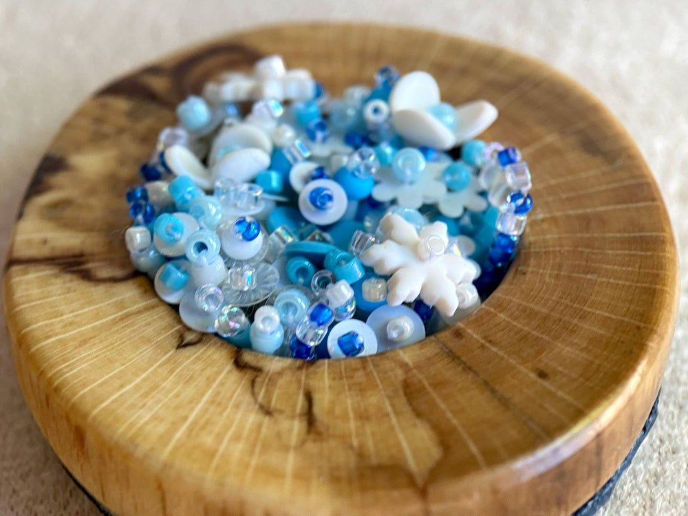 Exclusive wooden pendant with volume-beaded inlay crafted in floral motif using light blue and white hues - Ornamentico shop