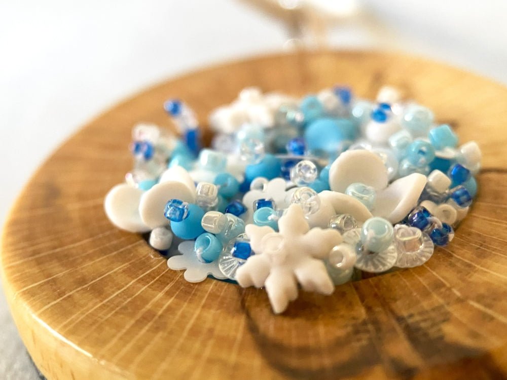 Exclusive wooden pendant with volume-beaded inlay crafted in floral motif using light blue and white hues - Ornamentico shop