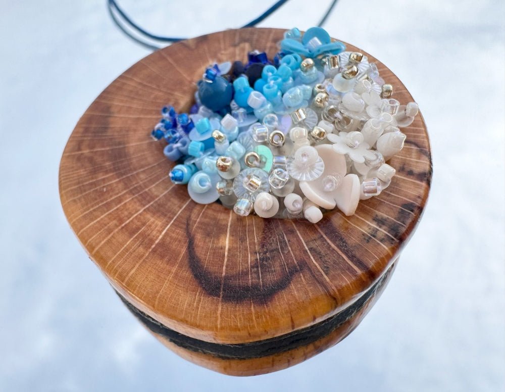 Exclusive wooden pendant with volume-beaded center crafted in elegant gradient white-to-blue colors - Ornamentico shop