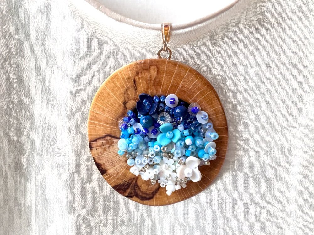 Exclusive wooden pendant with volume-beaded center crafted in elegant gradient white-to-blue colors - Ornamentico shop