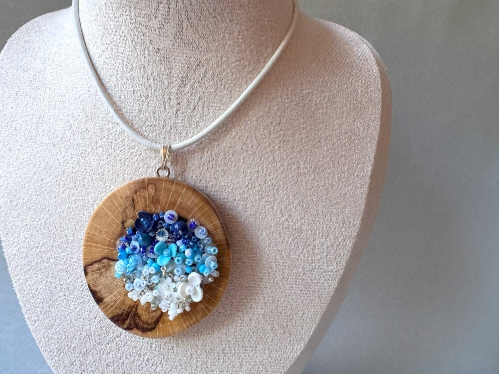 Exclusive wooden pendant with volume-beaded center crafted in elegant gradient white-to-blue colors - Ornamentico shop
