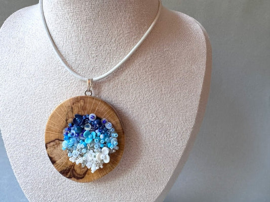 Exclusive wooden pendant with volume-beaded center crafted in elegant gradient white-to-blue colors - Ornamentico shop