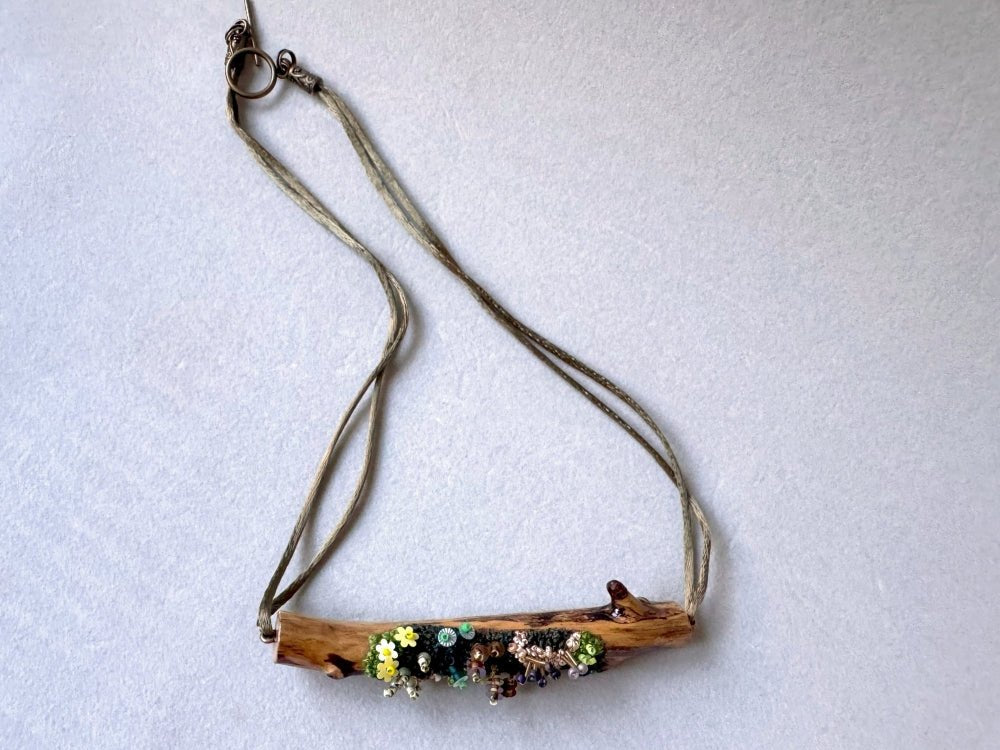 Exclusive wooden pendant decorated by the embroidered and volume-beaded element imitating moss - Ornamentico shop