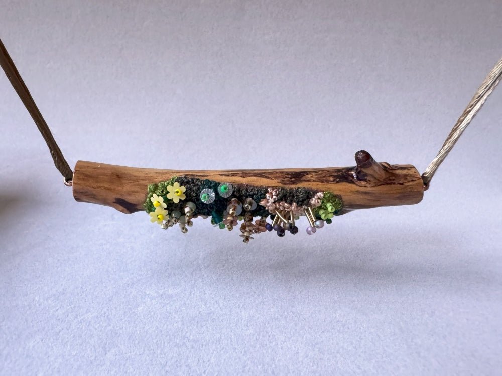 Exclusive wooden pendant decorated by the embroidered and volume-beaded element imitating moss - Ornamentico shop