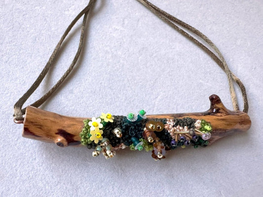 Exclusive wooden pendant decorated by the embroidered and volume-beaded element imitating moss - Ornamentico shop