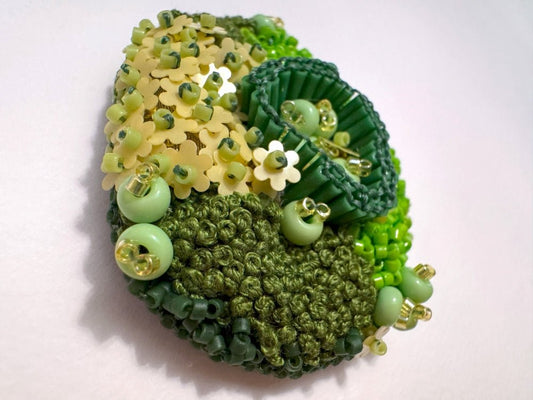 Handmade brooch inspired by natural forms created in sculptural beading style from green and yellow beads, sequins and embroidery - Ornamentico shop