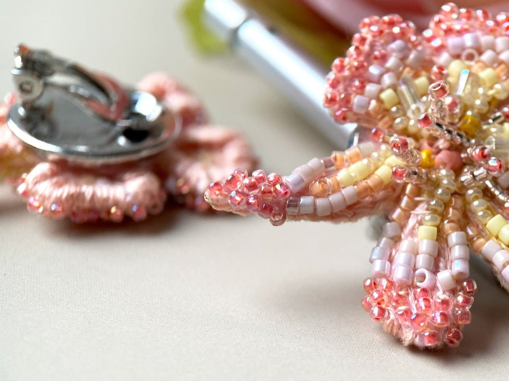 Exclusive handmade sculpturally beaded orchid clip-on earrings in coral tones - Ornamentico shop