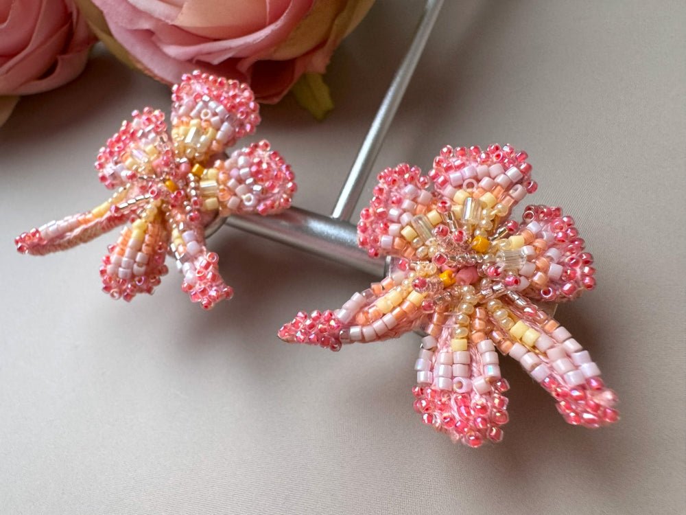 Exclusive handmade sculpturally beaded orchid clip-on earrings in coral tones - Ornamentico shop