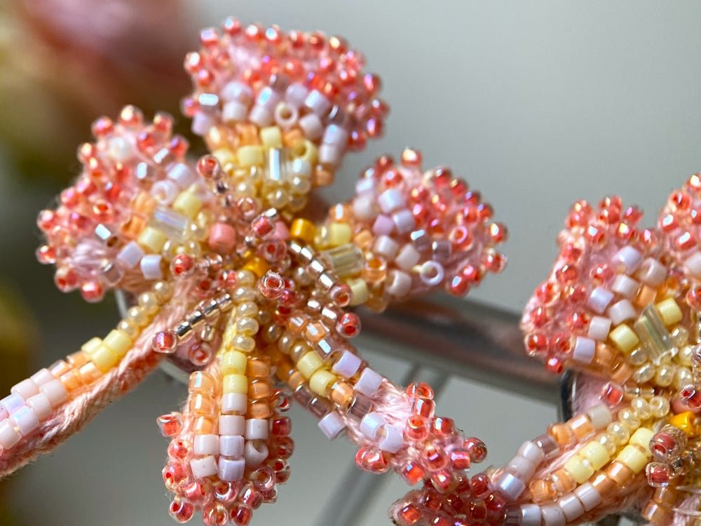 Exclusive handmade sculpturally beaded orchid clip-on earrings in coral tones - Ornamentico shop