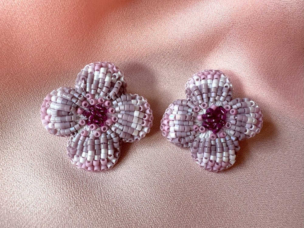 Handmade floral stud earrings is crafted in pink hues from Japanese glass beads using a sculptural technique, inspired by the geometric elegance of a rosette - Ornamentico shop