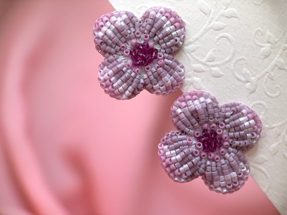 Handmade floral stud earrings is crafted in pink hues from Japanese glass beads using a sculptural technique, inspired by the geometric elegance of a rosette - Ornamentico shop