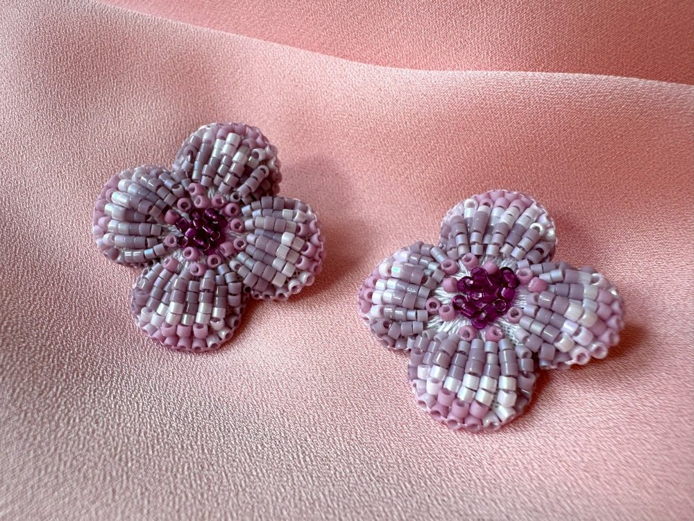 Handmade floral stud earrings is crafted in pink hues from Japanese glass beads using a sculptural technique, inspired by the geometric elegance of a rosette - Ornamentico shop