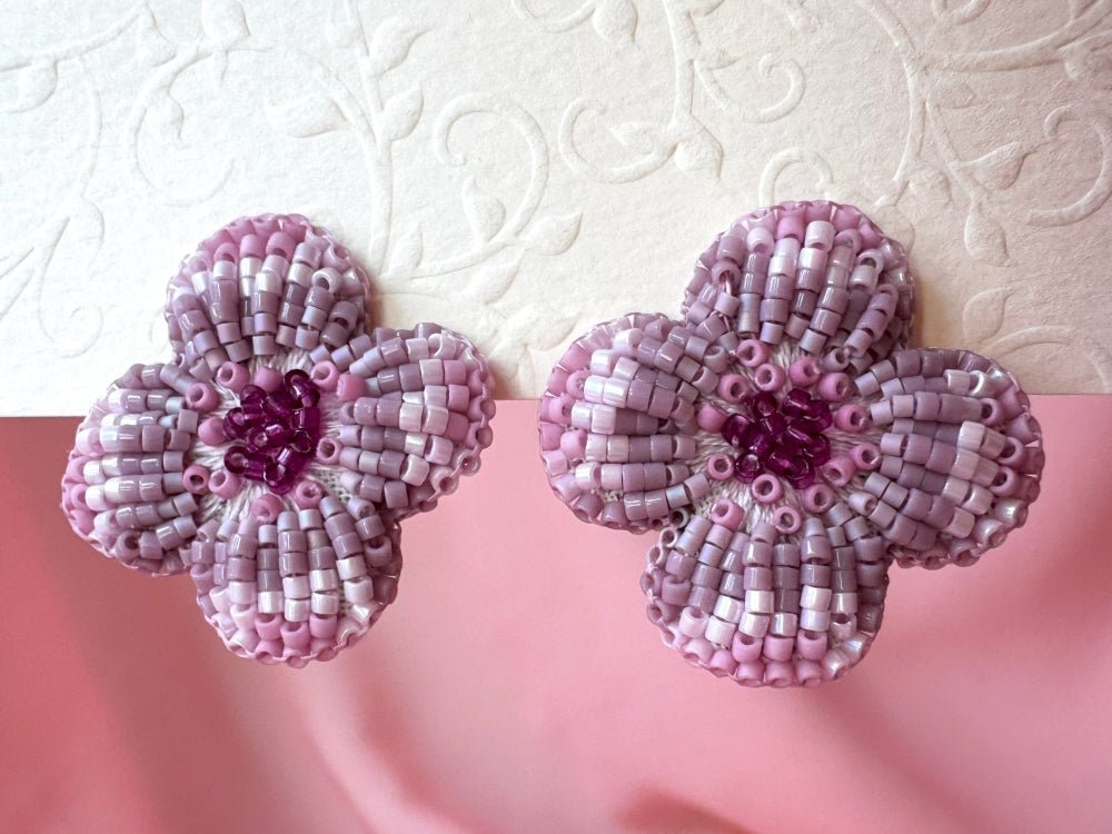 Handmade floral stud earrings is crafted in pink hues from Japanese glass beads using a sculptural technique, inspired by the geometric elegance of a rosette - Ornamentico shop