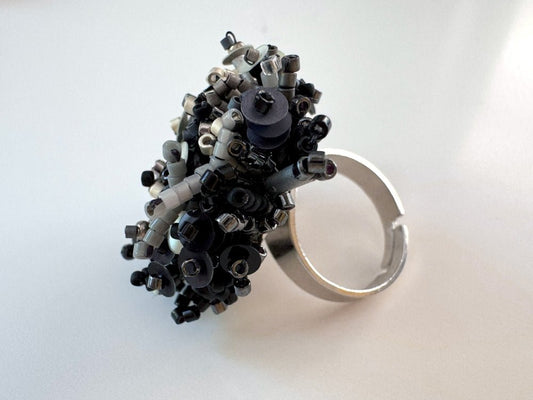 Handmade volume-beaded statement ring with floral design in classic black tones - Ornamentico shop