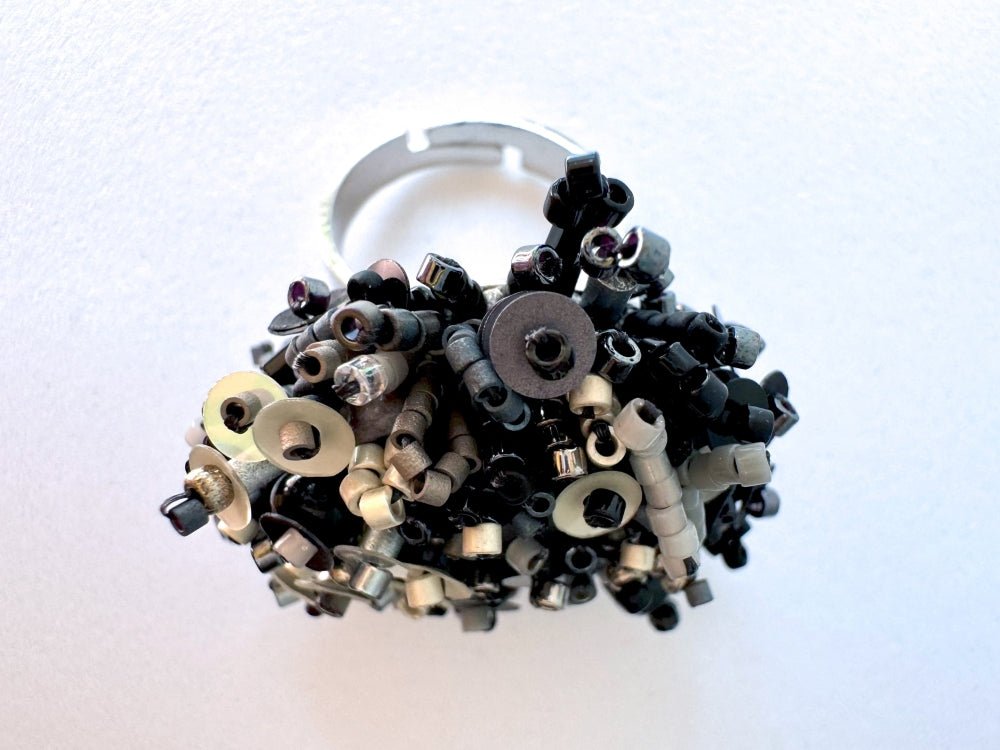 Handmade volume-beaded statement ring with floral design in classic black tones - Ornamentico shop