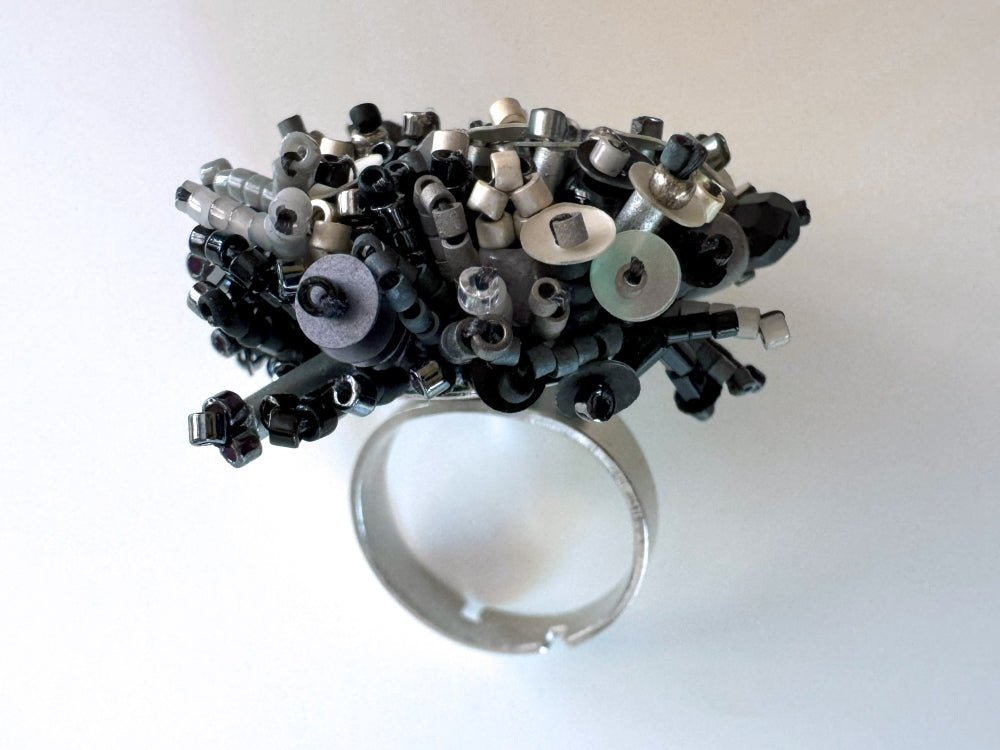Handmade volume-beaded statement ring with floral design in classic black tones - Ornamentico shop