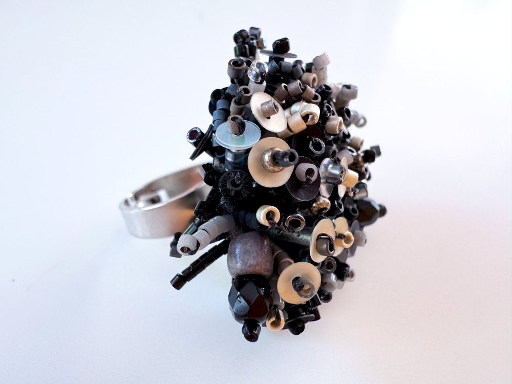 Handmade volume-beaded statement ring with floral design in classic black tones - Ornamentico shop