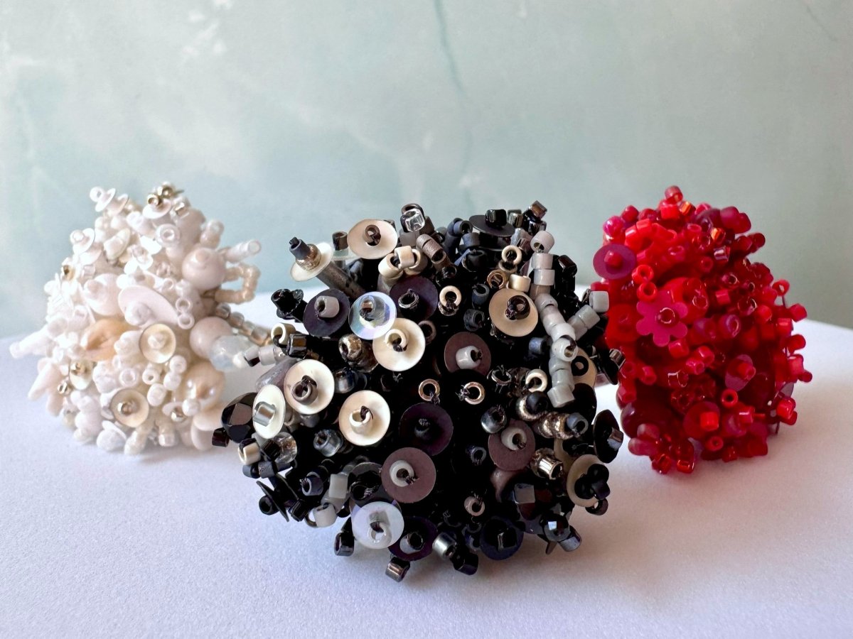 Handmade volume-beaded statement ring with floral design in classic black tones - Ornamentico shop