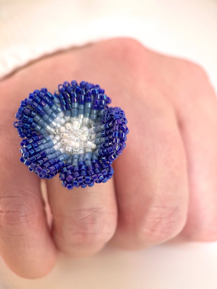 Handcrafted sculptural beaded ring shaped like a blue clematis flower - Ornamentico shop