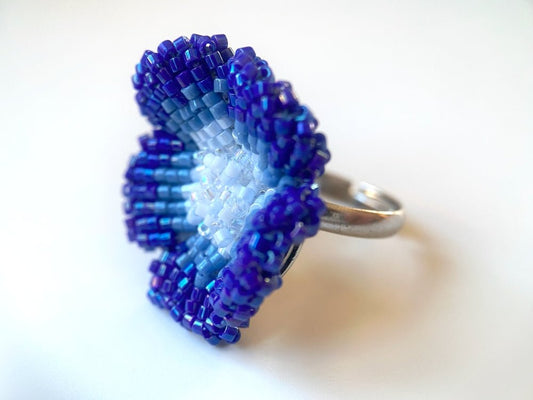 Handcrafted sculptural beaded ring shaped like a blue clematis flower - Ornamentico shop