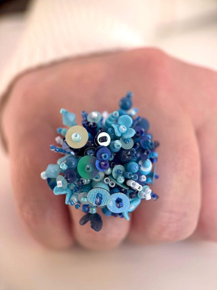 Handmade volume-beaded statement ring with floral design, polymer clay & sequins in blue hues - Ornamentico shop