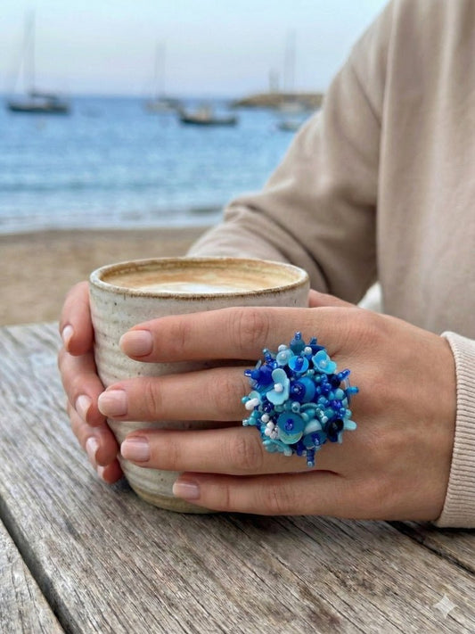 Handmade volume-beaded statement ring with floral design, polymer clay & sequins in blue hues - Ornamentico shop