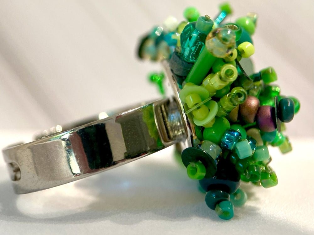 Handmade volume-beaded statement ring with floral design in a variety of green hues - Ornamentico shop