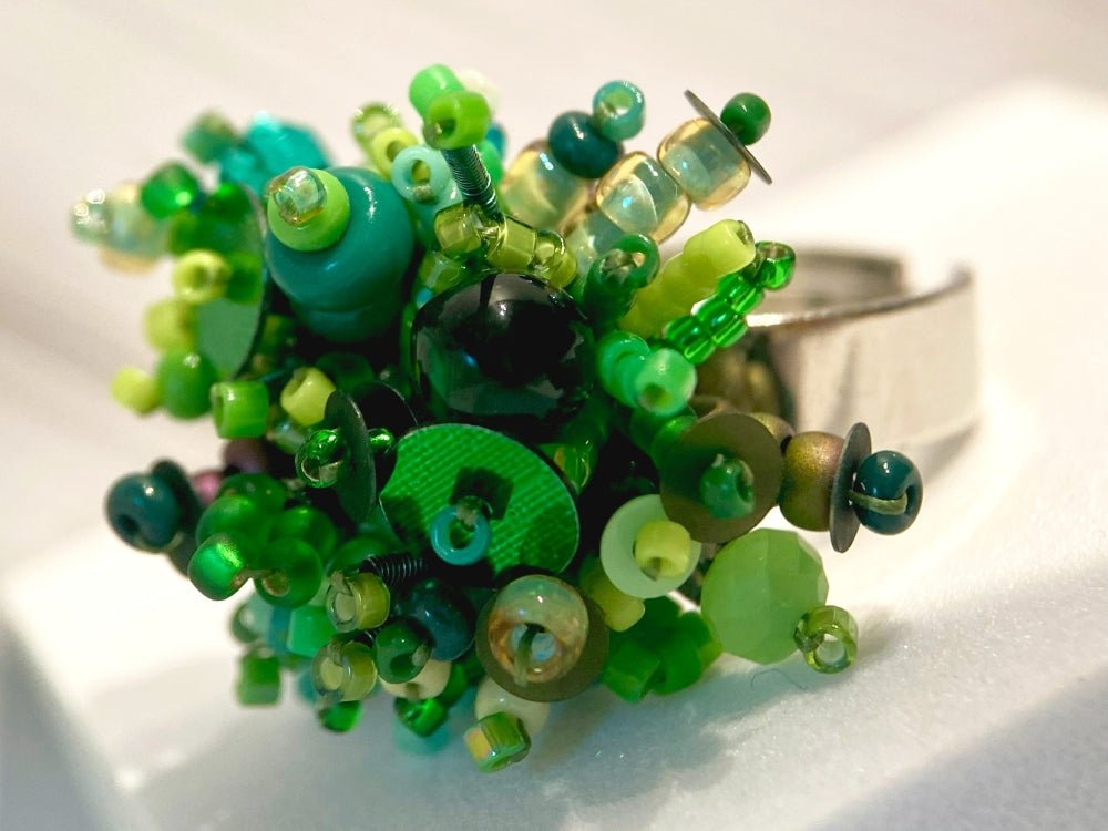 Handmade volume-beaded statement ring with floral design in a variety of green hues - Ornamentico shop