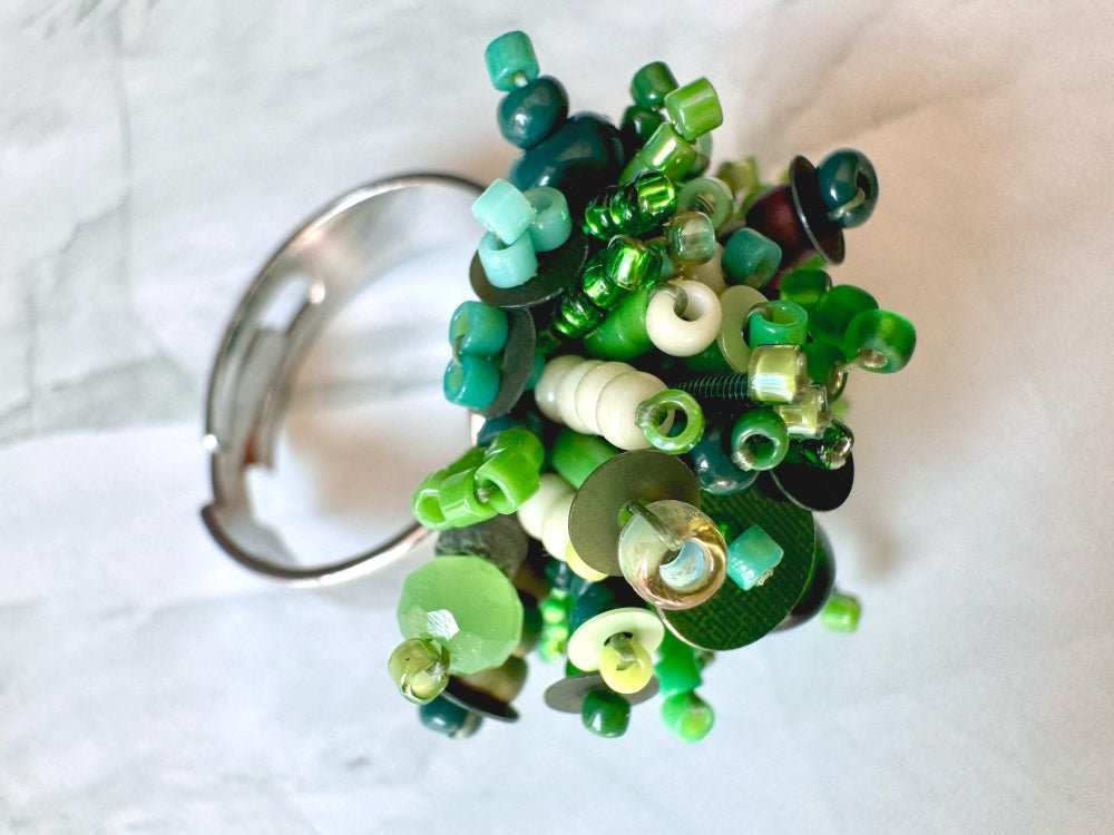 Handmade volume-beaded statement ring with floral design in a variety of green hues - Ornamentico shop