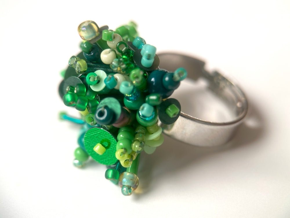 Handmade volume-beaded statement ring with floral design in a variety of green hues - Ornamentico shop