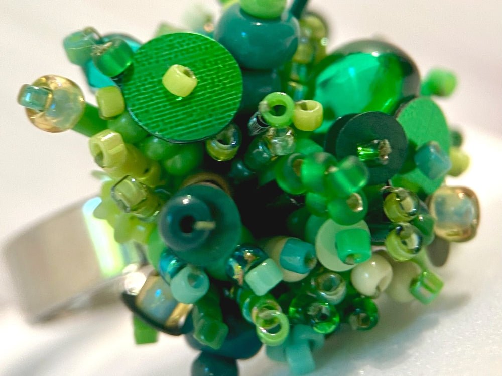 Handmade volume-beaded statement ring with floral design in a variety of green hues - Ornamentico shop