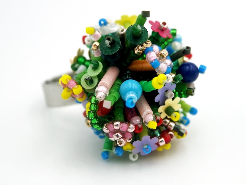 Handmade statement ring with volume beadwork in floral green and multicolor tones - Ornamentico shop