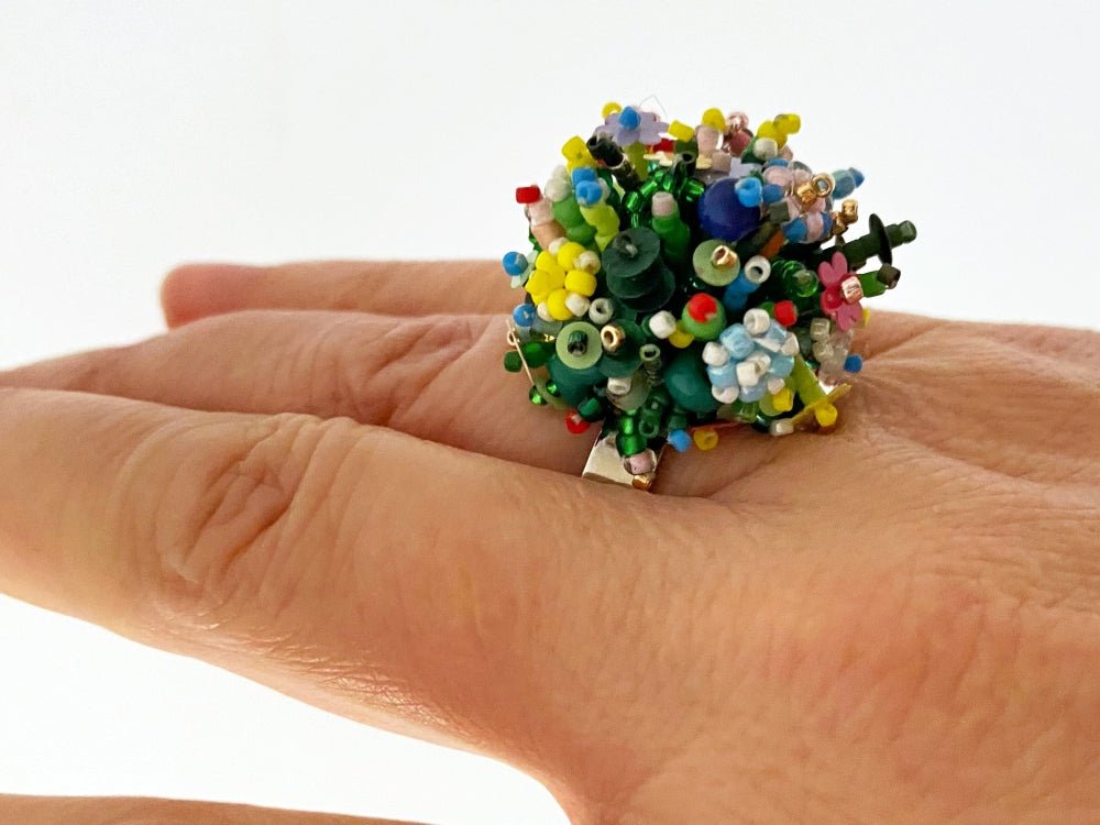 Handmade statement ring with volume beadwork in floral green and multicolor tones - Ornamentico shop