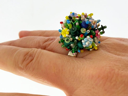 Handmade statement ring with volume beadwork in floral green and multicolor tones - Ornamentico shop