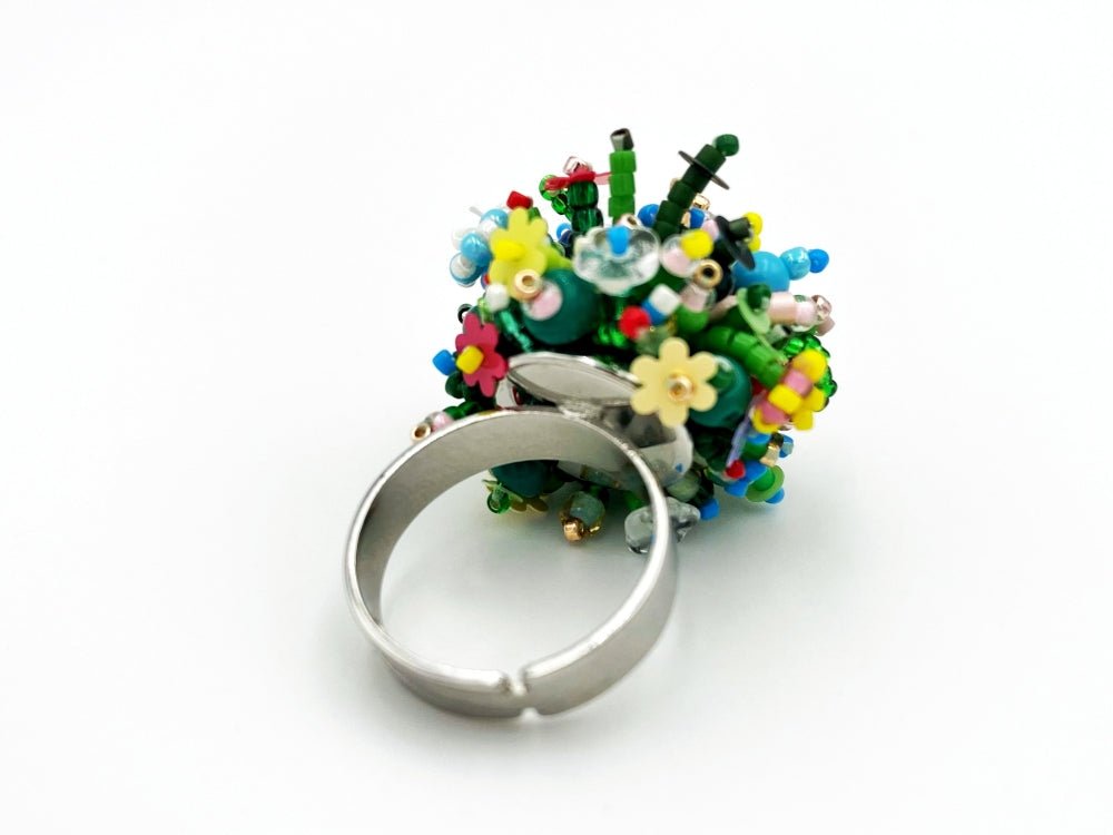Handmade statement ring with volume beadwork in floral green and multicolor tones - Ornamentico shop