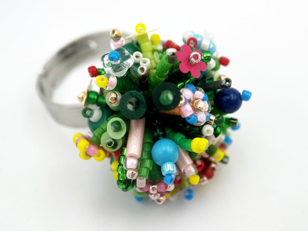 Handmade statement ring with volume beadwork in floral green and multicolor tones - Ornamentico shop