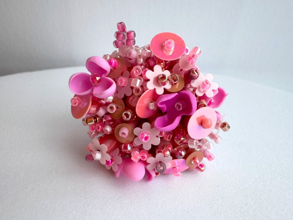 Handmade volume-beaded statement ring with floral design, polymer clay & sequins in pink hues - Ornamentico shop