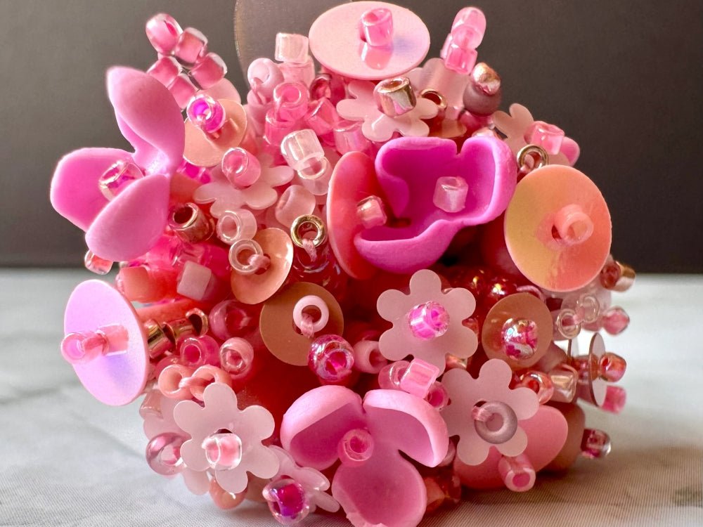 Handmade volume-beaded statement ring with floral design, polymer clay & sequins in pink hues - Ornamentico shop
